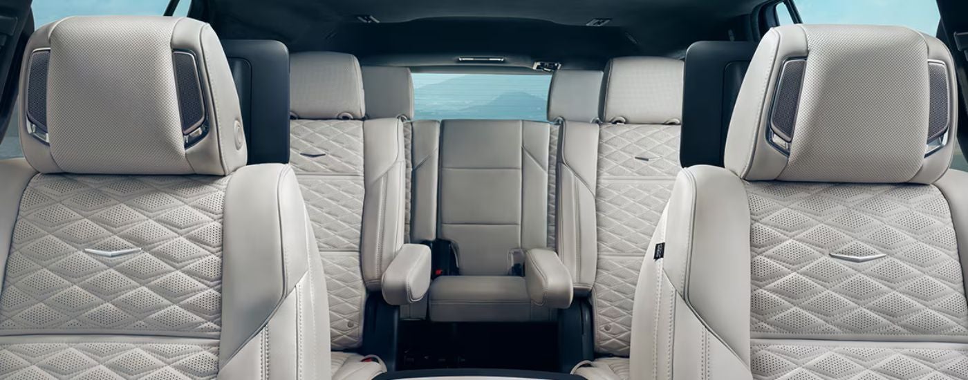 The white leather interior of a 2026 Cadillac Escalade.