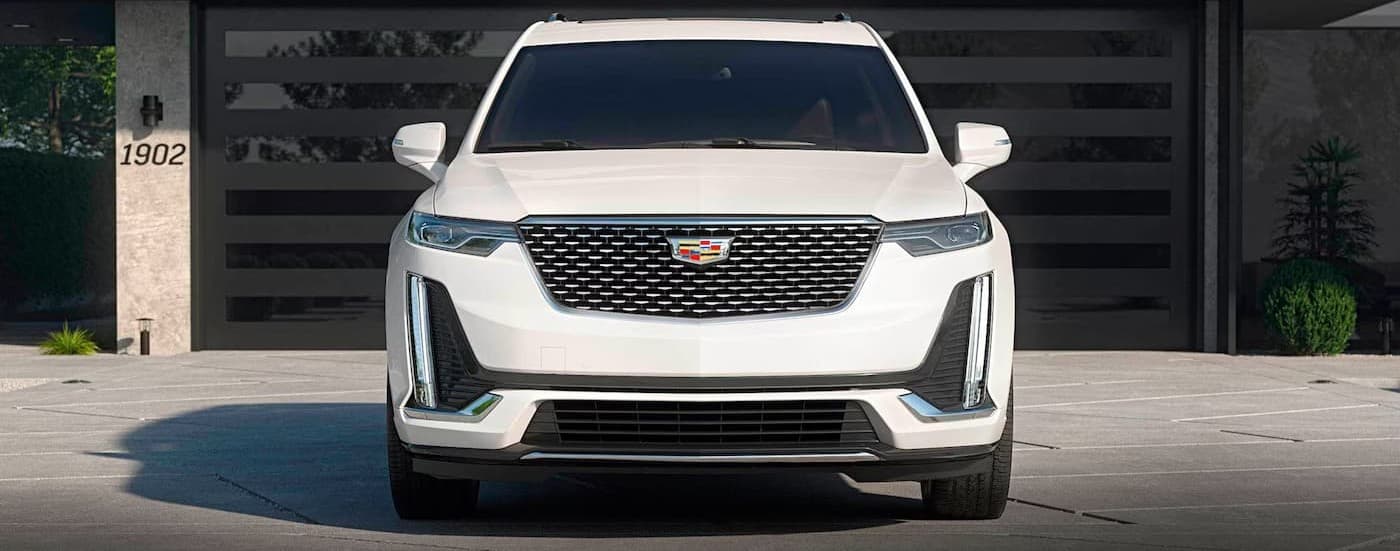 A white 2026 Cadillac XT6 parked on a sunny day.