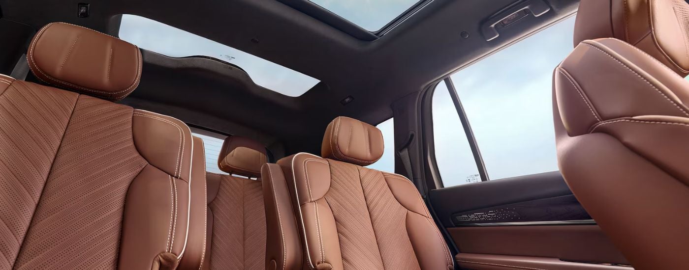 Light brown seats and sunroof in a 2027 Cadillac VISTIQ.