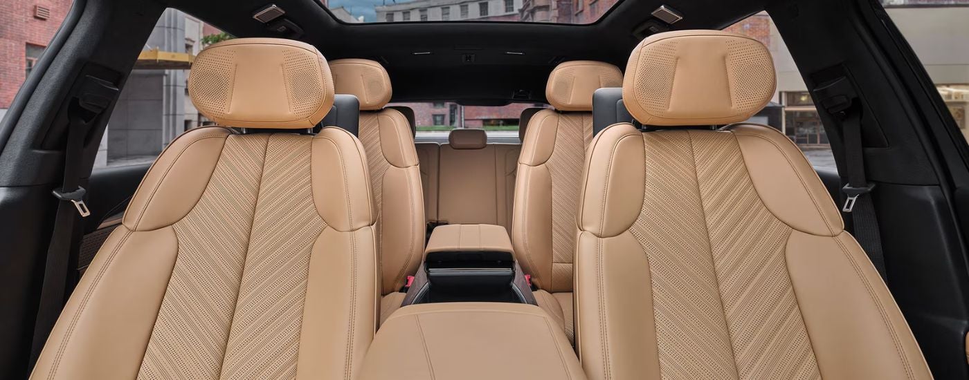 Tan leather seats in a 2026 Cadillac Escalade IQ.